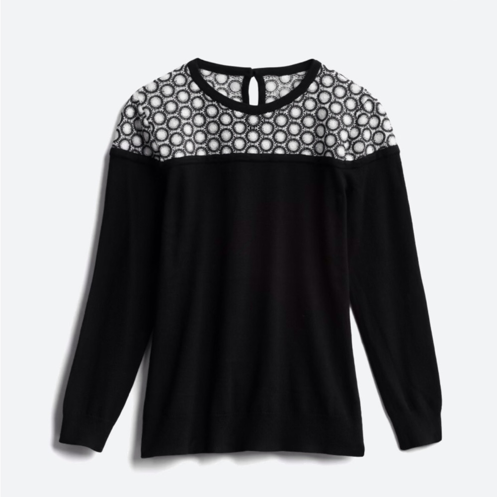 Black and white crochet embroidered sweater.